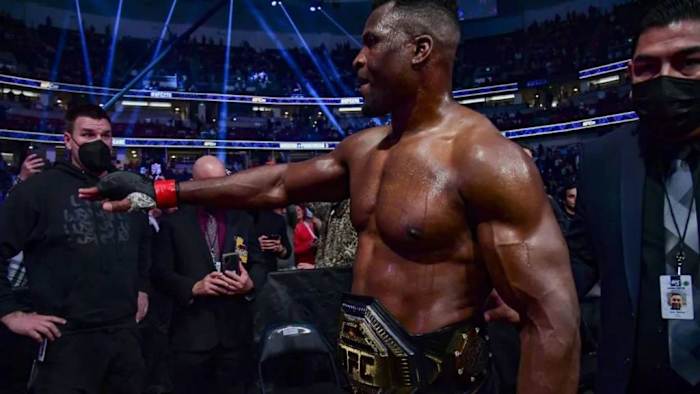 Francis Ngannou celebrates after defeating Ciryl Gane by unanimous decision in their heavyweight title fight during the UFC 270 event in Anaheim, California. After the Anthony Joshua bout, Francis Ngannou will go back to MMA. KATELYN MULCAHY/GETTY IMAGES.